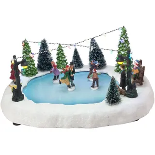 Spetebo LED Weihnachts Dorf Szene Eisbahn - 32 x 24 cm - Beleuchtete Tisch Dekoration mit fahrenden Figuren