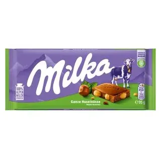 MILKA Ganze Haselnüsse Nougat 95 g