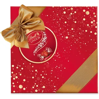 Lindt Schokolade LINDOR Präsent im Geschenkpapier Milch | 375g | LINDOR Milch Kugeln mit unendlich zartschmelzender Füllung | Schokoladengeschenk | Pralinengeschenk